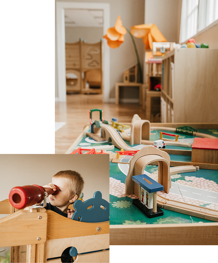 toy train set and child looking through toy telescope